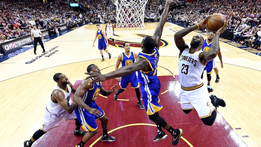 LeBron James goes for the dunk against Golden State