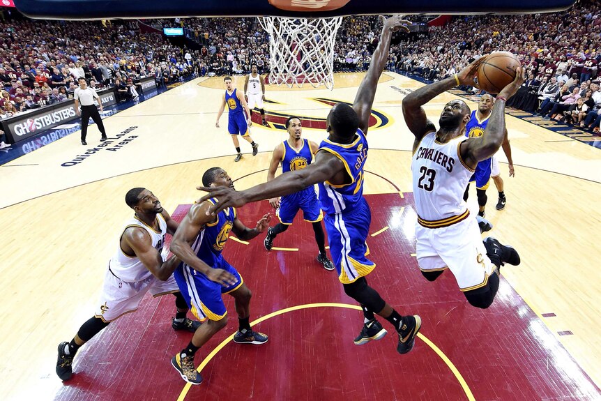 LeBron James goes for the dunk against Golden State