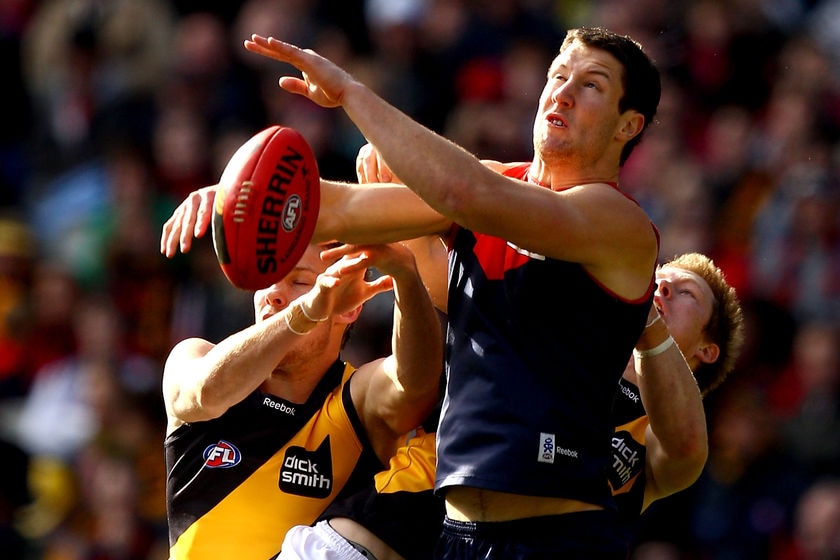 Melbourne's James Frawley spoils a mark by Jack Riewoldt against Richmond at the MCG in August 2010.