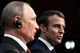 Emmanuel Macron and Vladimir Putin give a joint press conference.