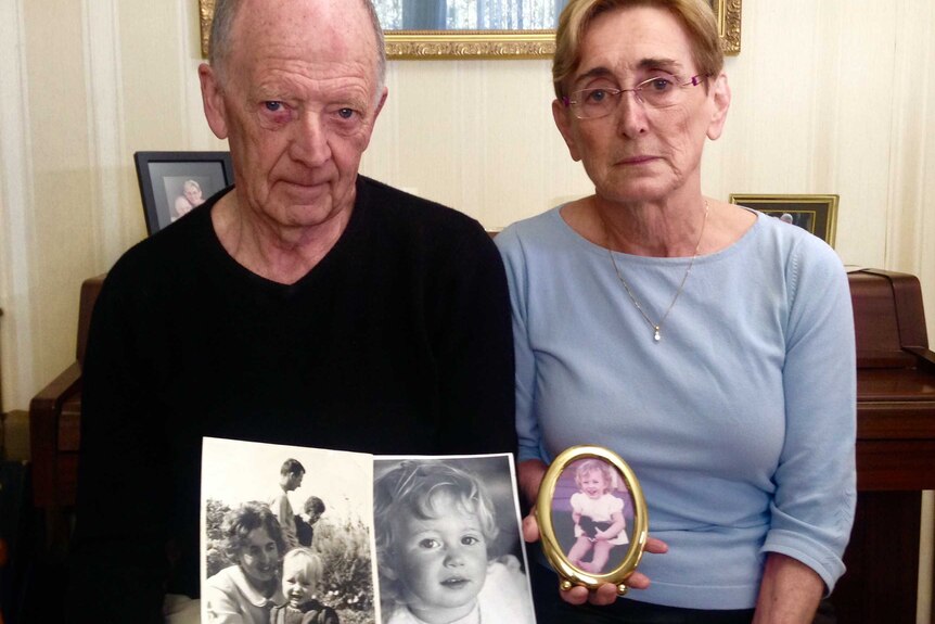 Greg and Christine Gordon hold photos of their missing daughter Kirste.