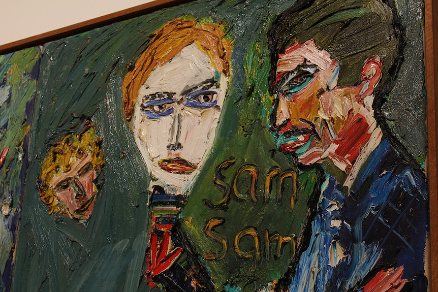 A close up of an oil painting of a blonde man and brunette woman standing close with the word "sam" painted beneath.