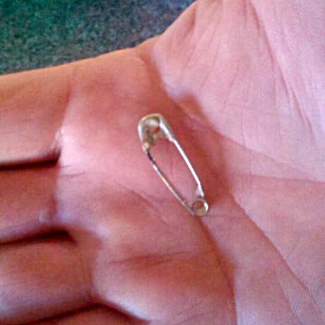 Safety pin found in cheese