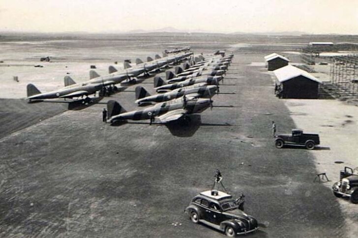 WWII bombers on tarmac 