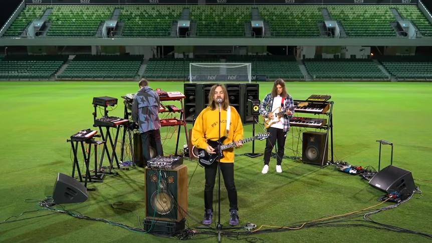 Tame Impala performing in an empty stadium for FIFA 21 livestream