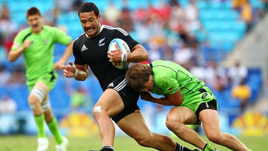 Solomon King of NZ tackles by Australian player at Gold Coast Sevens