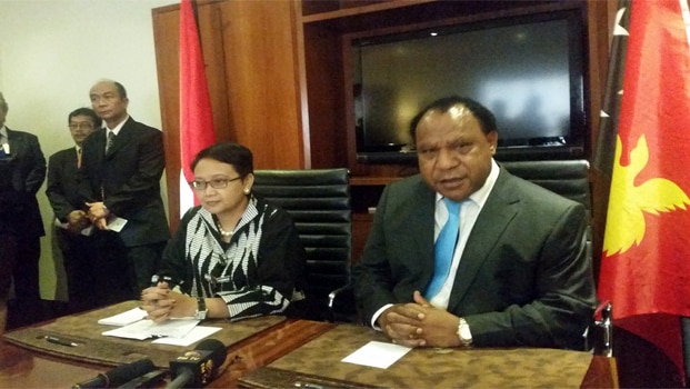 Indonesian foreign minister Retno Marsudi and her PNG counterpart Rimbink Pato speak to the media in Port Moresby