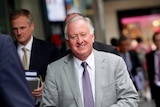 Brian Flannery (centre) leaves the Independent Commission Against Corruption.