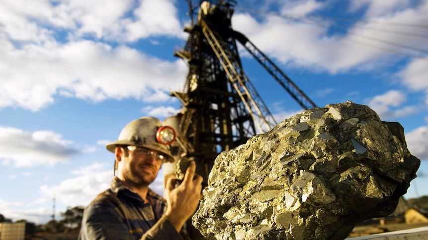 mine worker with nickel ore