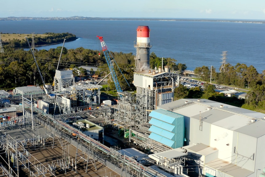 A power station next to the ocean, as seen from above.