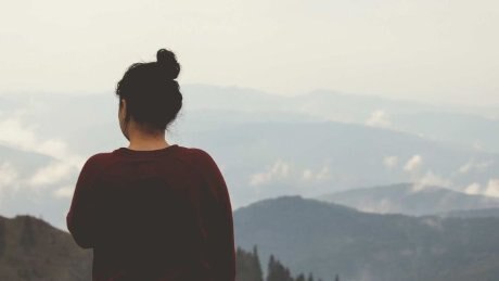 Girl on a mountain.