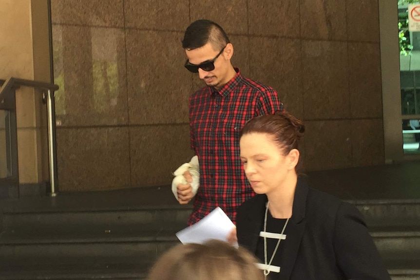 Angelo Gargasoulas leaves court after being charged with a number of offences.