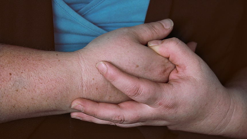 Close up photo of a pair of woman's hands.