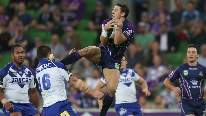 On report ... Billy Slater (R) makes contact with David Klemmer