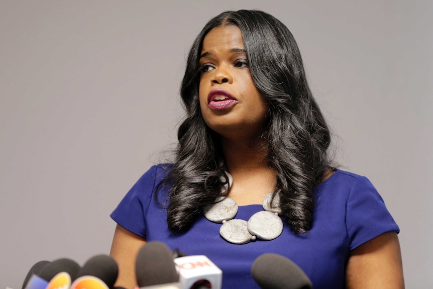 A close up pf attorney Kim Foxx speaking at a news conference