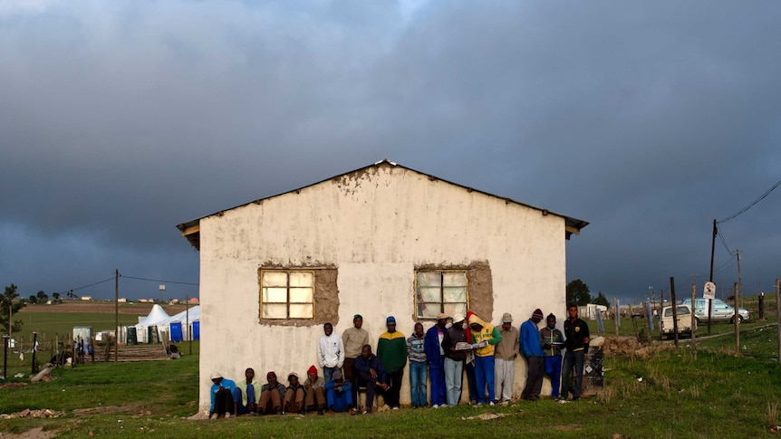 Residents of Qunu gather near Nelson Mandela's house