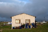 Residents of Qunu gather near Nelson Mandela's house