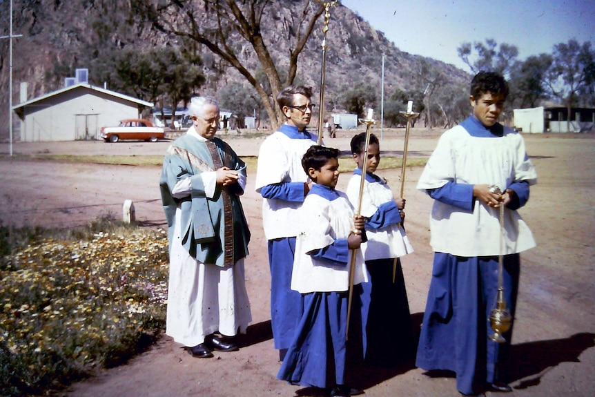 Boys participating in an anglican service