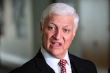 Independent Federal MP Bob Katter looks surprised as he speaks to reporters.