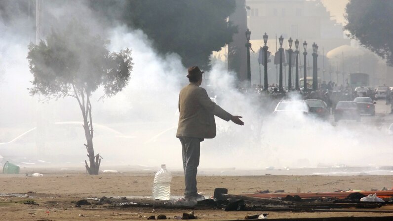 Man stands in Tahrir Square as protests rage (David Hollier)