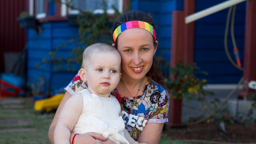 Sarah Betts and her child Isabell at their home in Kalgoorlie-Boulder.