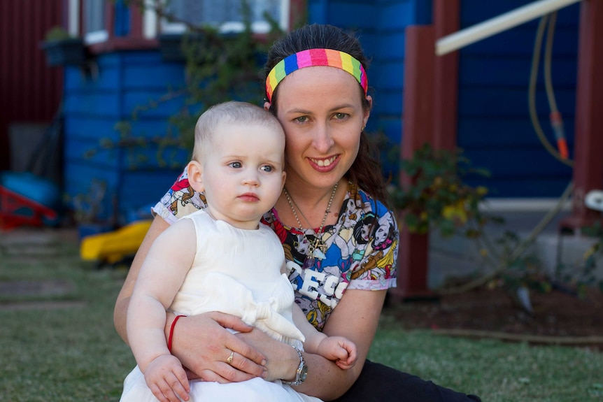 Sarah Betts and her child Isabell at their home in Kalgoorlie-Boulder.