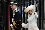 Camilla, the Duchess of Cornwall, and Prince Charles arrive at the West Door of Westminster Abbey
