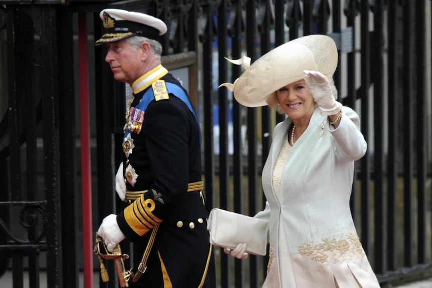 Camilla, the Duchess of Cornwall, and Prince Charles arrive at the West Door of Westminster Abbey