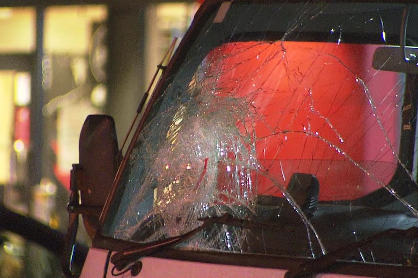 The cracked windscreen of a truck involved in a fatal crash.