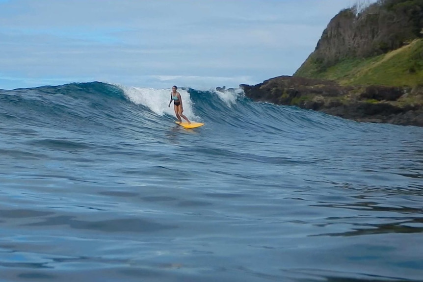 Julia from California surfing at Lord Howe Island.