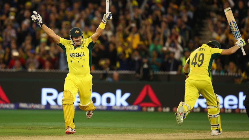 Shane Watson and Steve Smith celebrate Australia winning the cricket World Cup