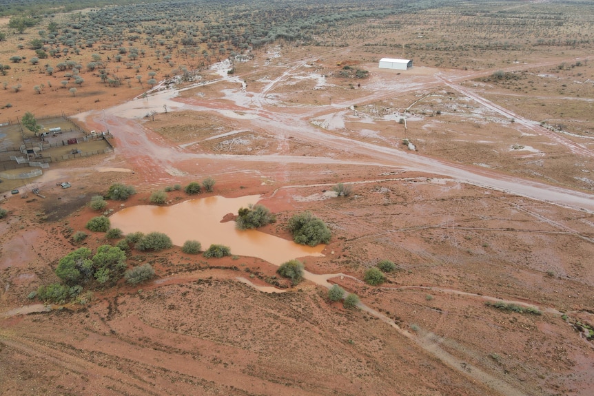 An aerial shot of an outback station after rain.