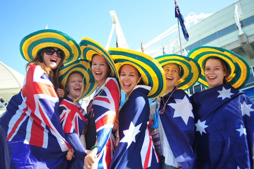 A group of girls in Melbourne get into the mood of Australia Day one day early at the Australian Open on January 25, 2012.