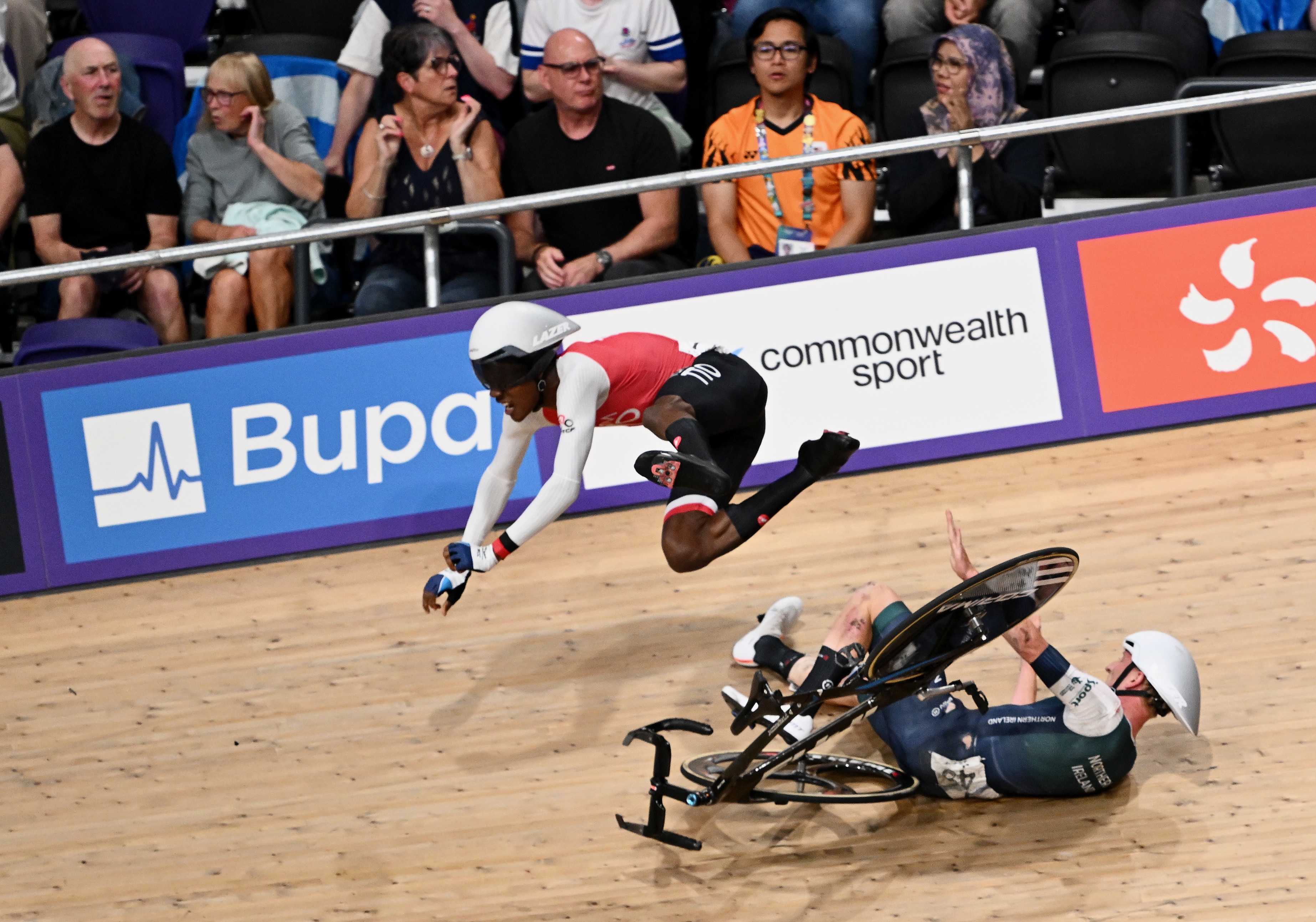 Riders sent flying in spectacular crash as Aussie avoids carnage to medal