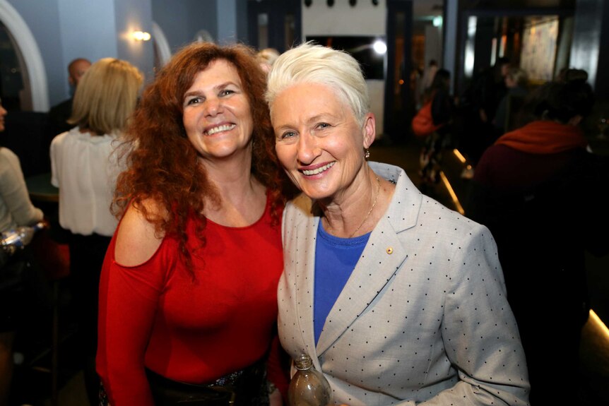 Natalie Isaacs with Kerryn Phelps smiling at the camera