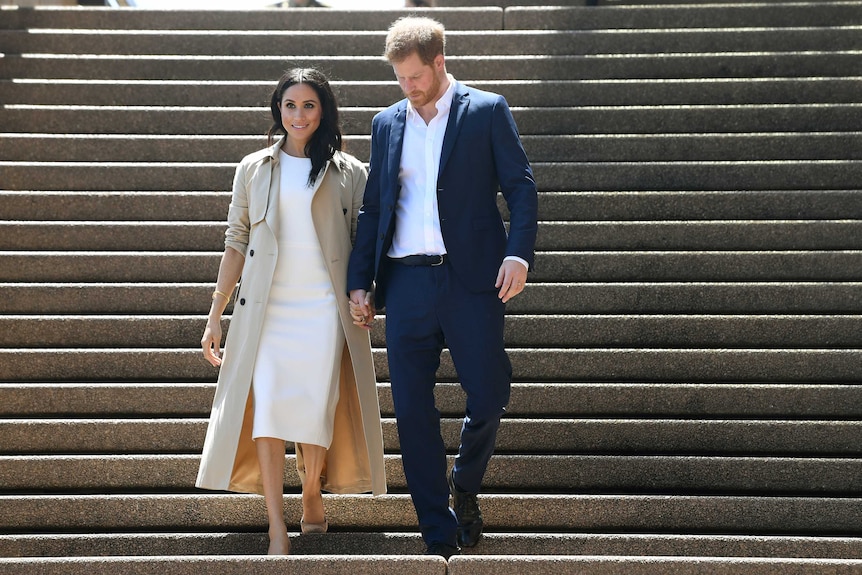 Prince Harry and Meghan on stairs