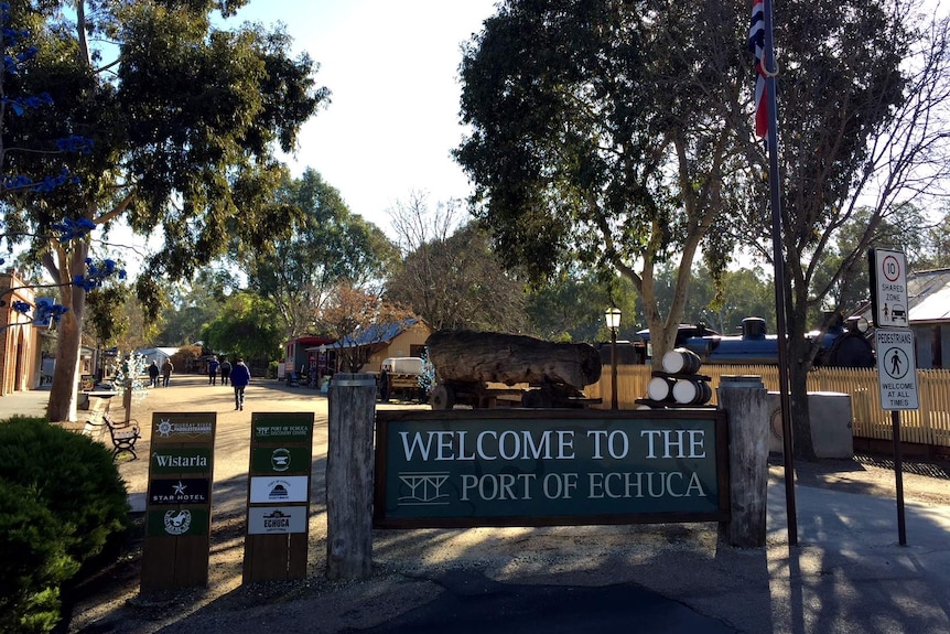 A sign welcoming visitors to the Port of Echuca tourism precinct.