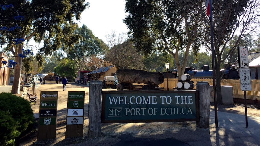 A sign welcoming visitors to the Port of Echuca tourism precinct.