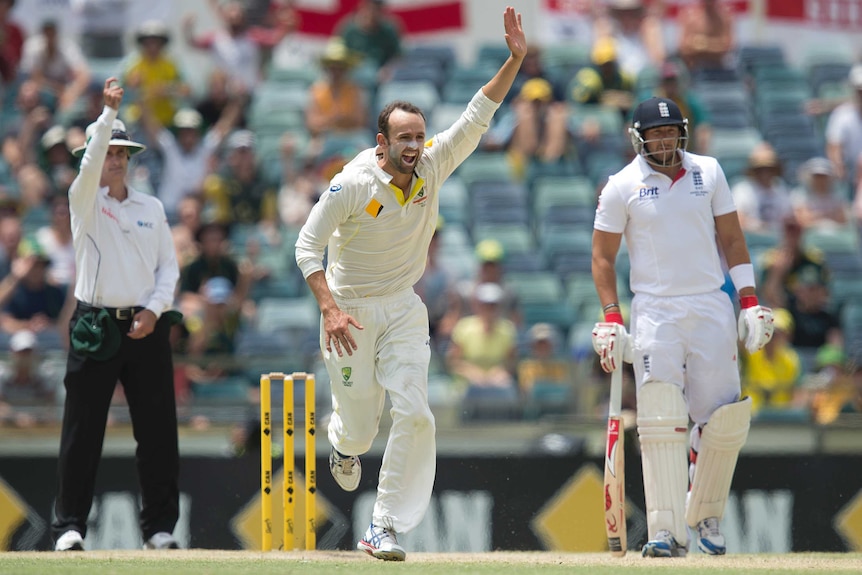 Nathan Lyon celebrates taking a wicket for Australia in the 2-13-14 Ashes series.