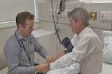 Doctor testing blood pressure