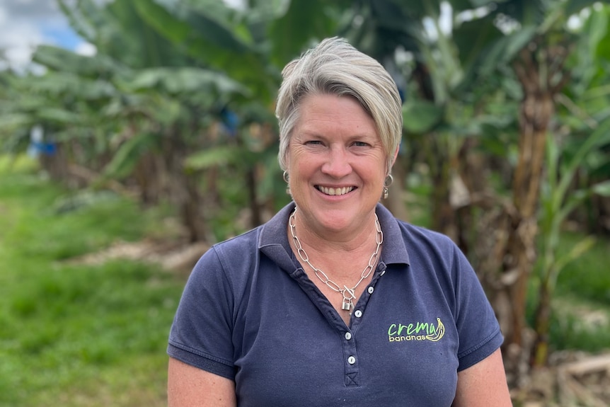 Banana grower Jenny Crema stands on her farm.