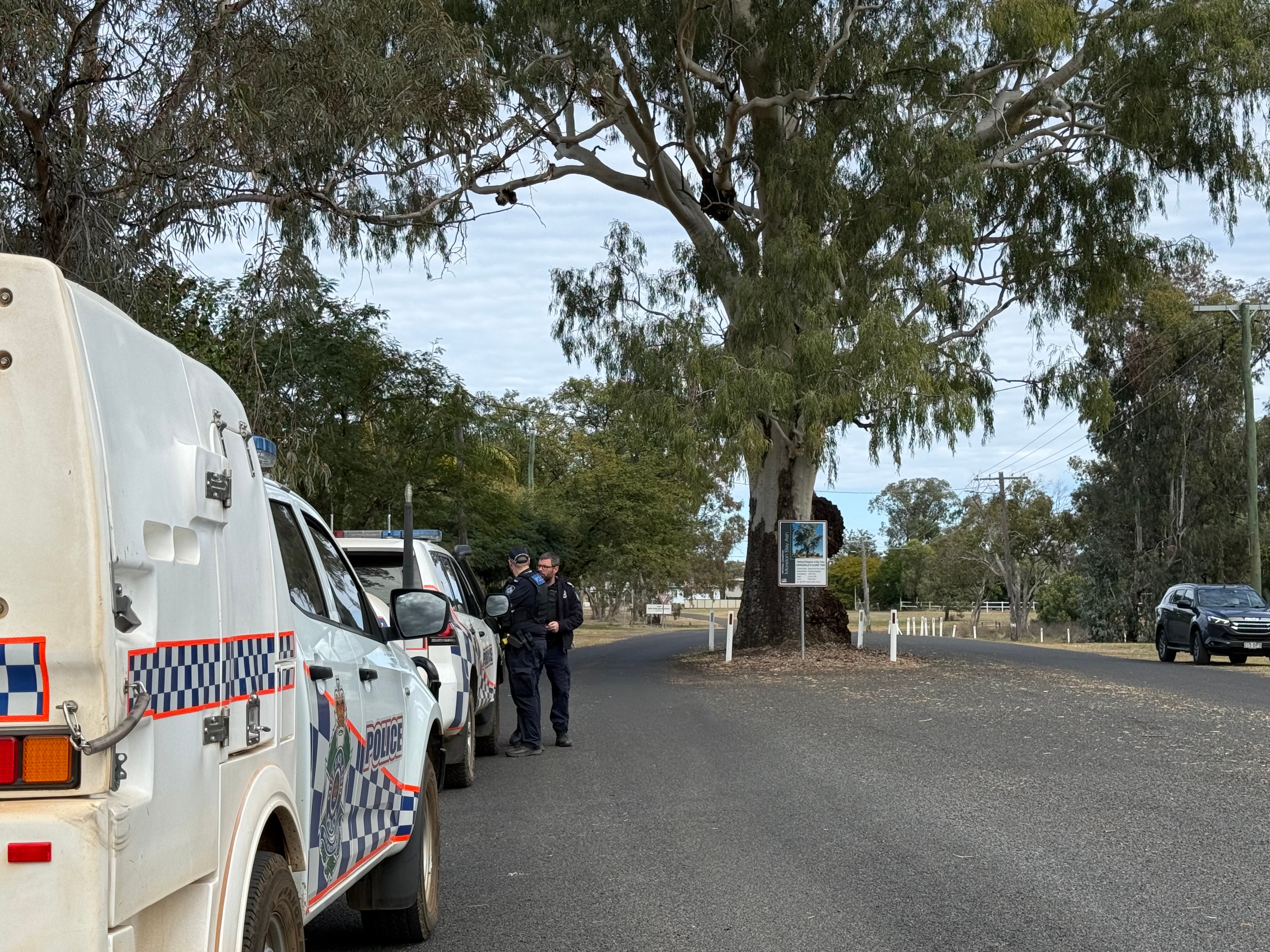 Police outside an outback Queensland home.