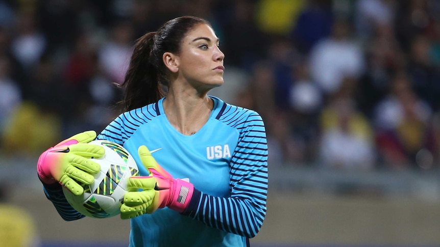 Hope Solo with the ball