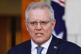 Prime Minister Scott Morrison in courtyard blue tie