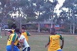 Canberra refugees take part in a football tournament to mark Refugee Week.