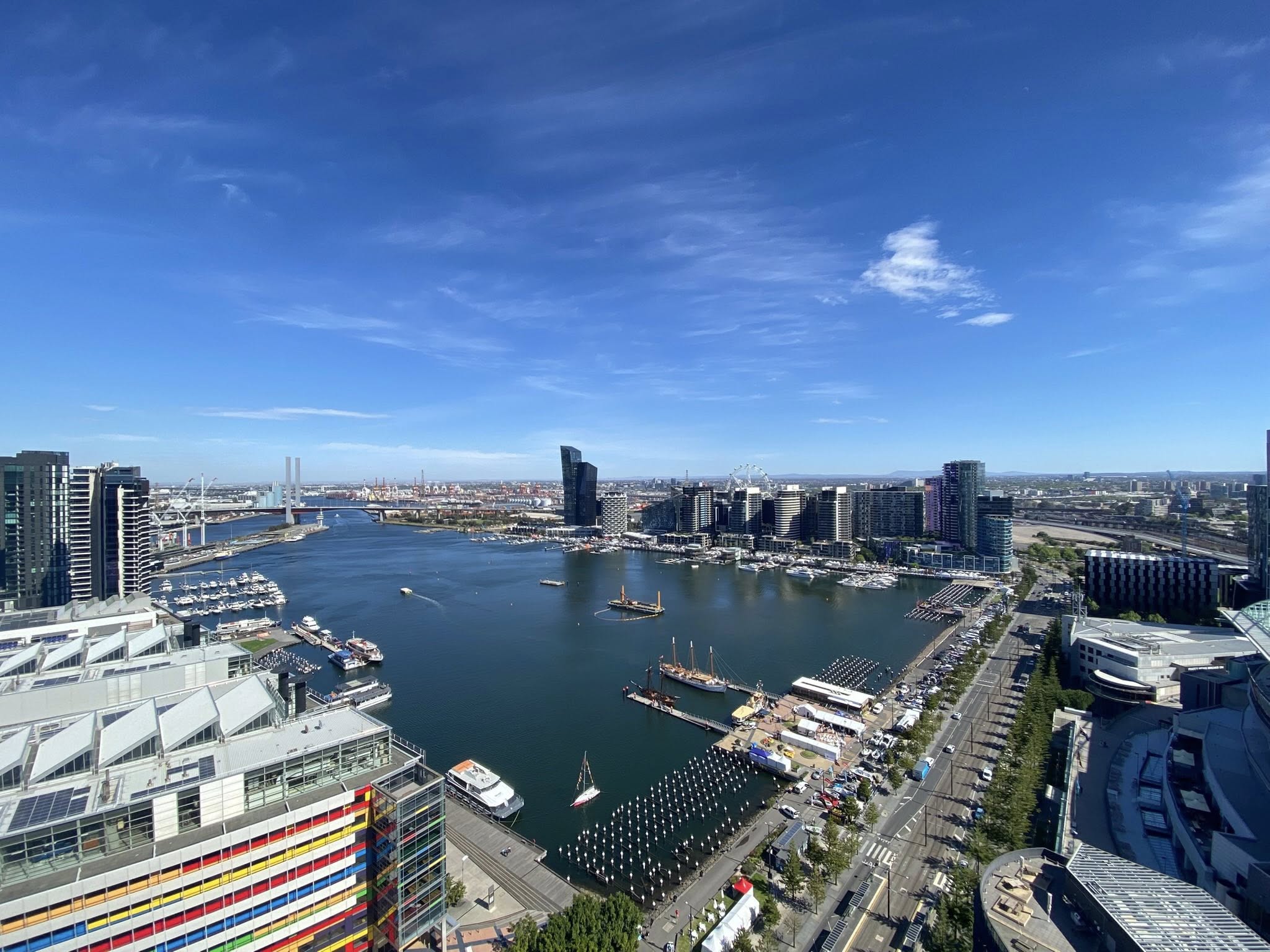 Melbourne skyline with harbour and blue skies.