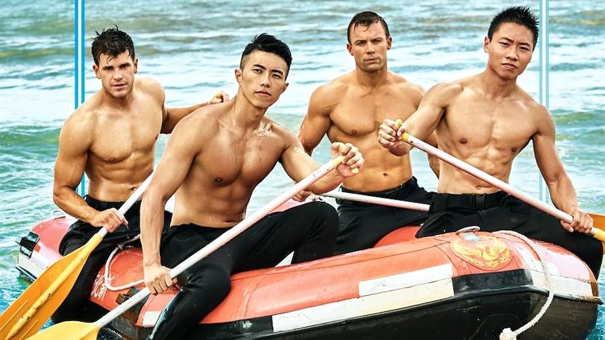 Two Australian firefighters pose with two Taiwanese firefighters on a boat for the 2020 joint calendar.