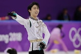 Yuzuru Hanyu reacts after his final performance in men's figure skating at the 2018 Winter Olympics.
