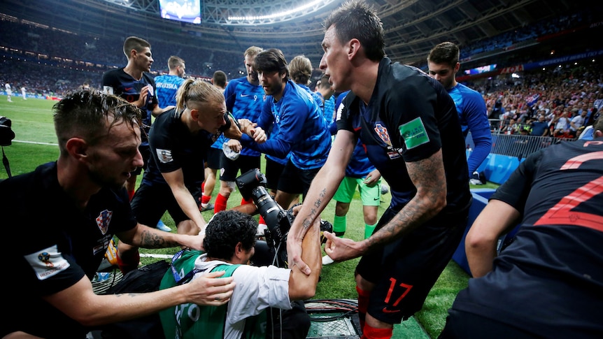 World Cup cameraman crushed at the bottom of Croatia celebration stack