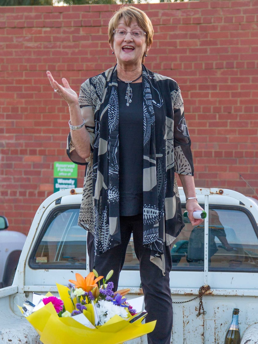 Kalgoorlie MP Wendy Duncan announces her retirement from the back of a ute.